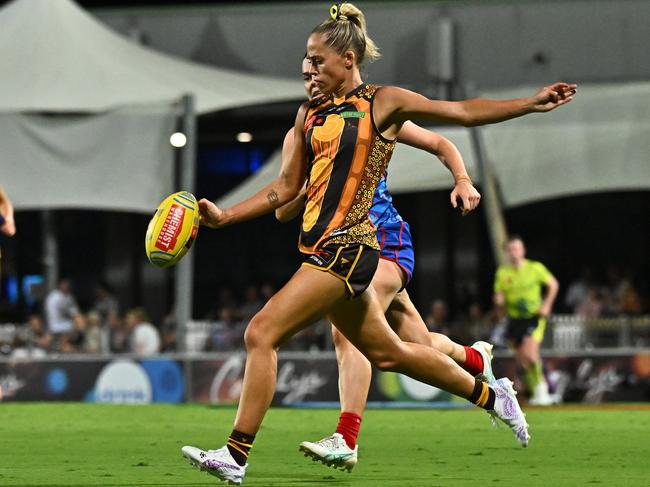 CAIRNS, AUSTRALIA - OCTOBER 24: Kaitlyn Ashmore of the Hawks kicks during the round nine AFLW match between Hawthorn Hawks and Narrm (Melbourne Demons) at Cazaly's Stadium, on October 24, 2024, in Cairns, Australia. (Photo by Emily Barker/Getty Images)