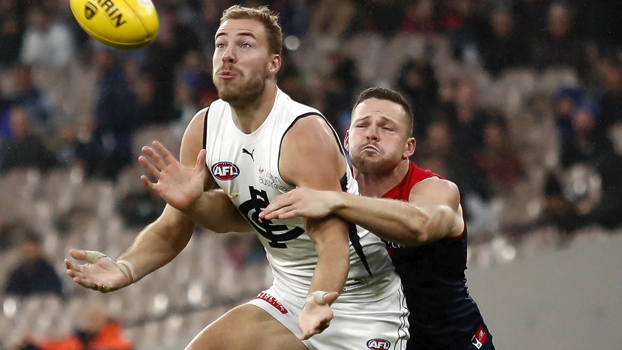 Steven May puts pressure on Carlton giant Harry McKay. Picture: AFL Photos/Getty Images