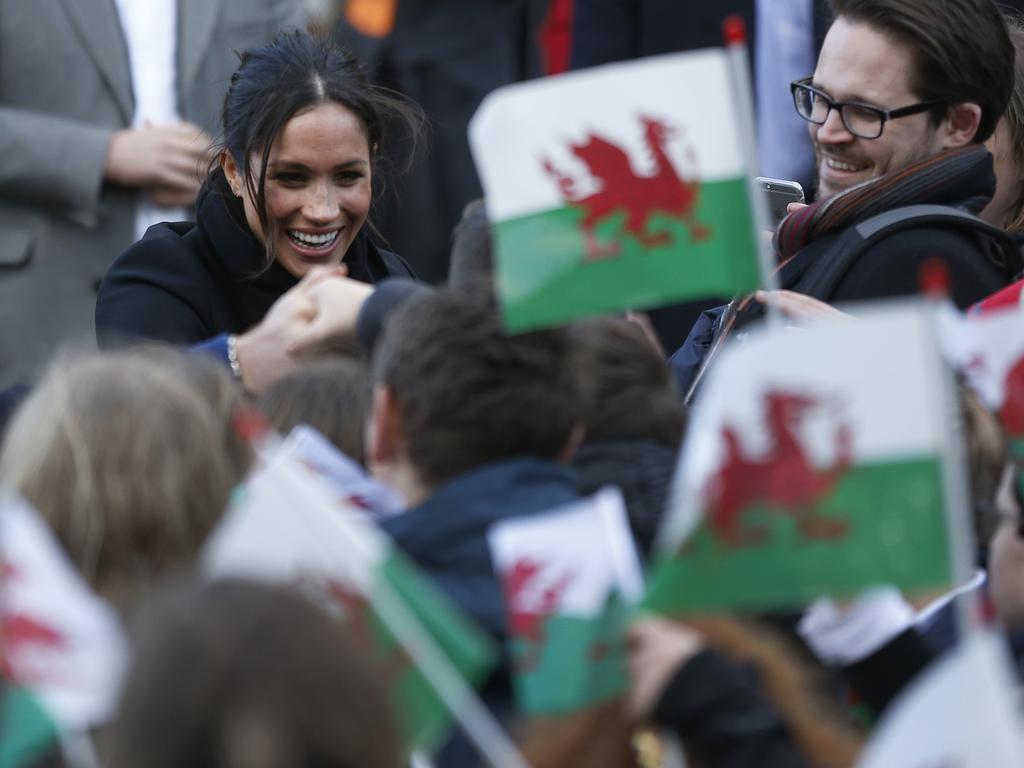 Britain’s Prince Harry and his fiancee Meghan Markle meet fans as they arrive for a visit to Cardiff Castle in Cardiff, Wales, Thursday, Jan.18, 2018. During their tour, Prince Harry and Ms. Markle will hear performances from musicians and poets, meet sportsmen and women, and see how organisations are working to promote Welsh language and cultural identity. Picture AP