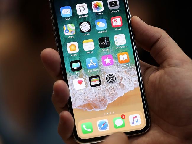 CUPERTINO, CA - SEPTEMBER 12: The new iPhone X is displayed during an Apple special event at the Steve Jobs Theatre on the Apple Park campus on September 12, 2017 in Cupertino, California. Apple held their first special event at the new Apple Park campus where they announced the new iPhone 8, iPhone X and the Apple Watch Series 3.   Justin Sullivan/Getty Images/AFP == FOR NEWSPAPERS, INTERNET, TELCOS & TELEVISION USE ONLY ==