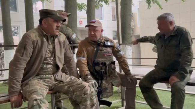 Leader of Russian mercenary group Wagner Yevgeny Prigozhin, centre, meets with Russia's Deputy Defence Minister Yunus-Bek Yevkurov and Vladimir Stepanovich Alekseev, the deputy chief of Russia's military intelligence service at the Southern Military District HQ. Picture: Twitter