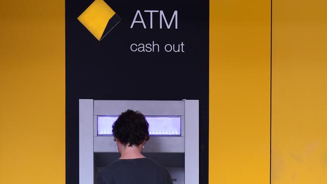 A customer uses a automatic teller machine. Picture: AAP