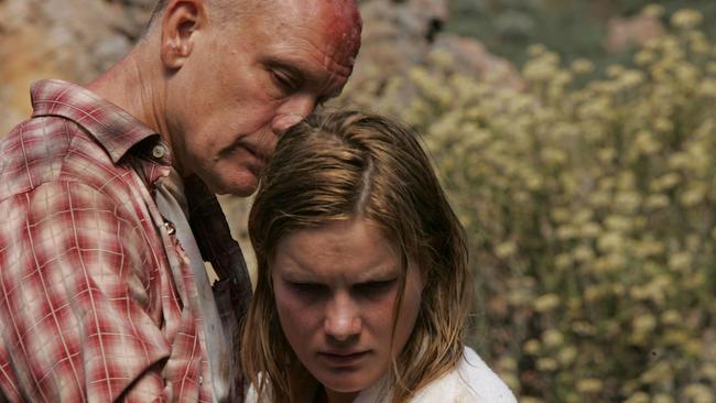 John Malkovich and Jessica Haines in <i>Disgrace</i>, a strong, perceptive, old-school art-house film.