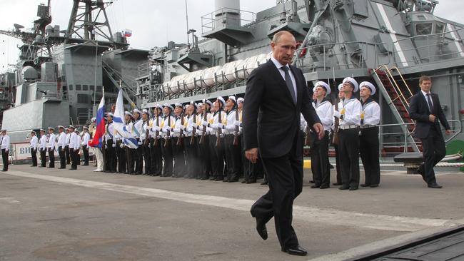 Vladimir Putin on a one-day visit to the new Russian Military Naval Base of Black Sea Fleet in 2014. Picture: Getty Images