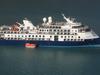 Nearly 100 Aussies stuck on grounded ship