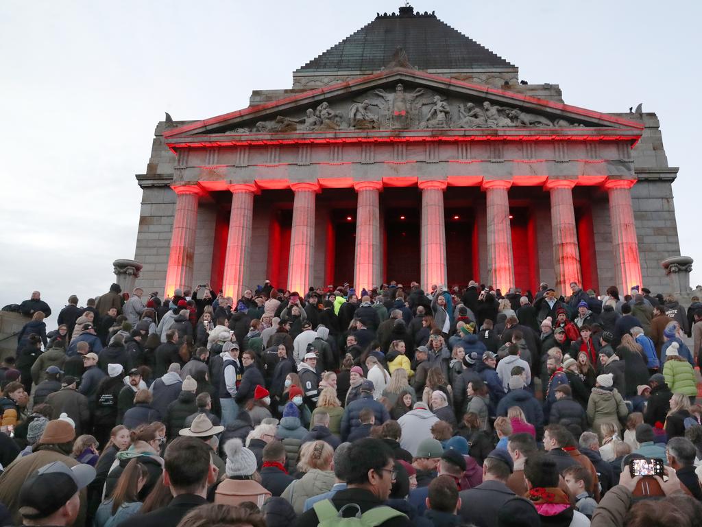 The Shrine of Remembrance was bathed in red light. Picture: David Crosling