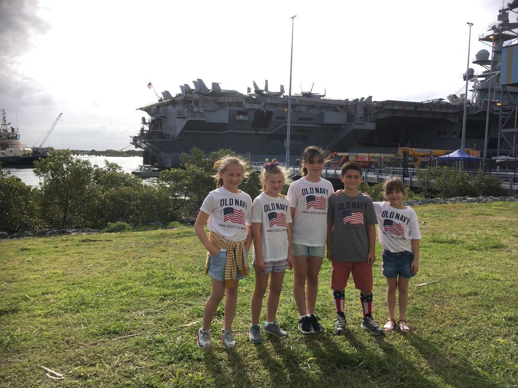 USS RONALD REAGAN - Quinn, 10, Evan, 8, and Reese, 6, said they couldn’t wait to see their dad Brent Jaquith who is the commander of strike fighter squadron VFA27. “I’m going to give him a big hug,” Evan Jaquith said. The children who live at the America base in Iwakuni, Japan, flew down to Brisbane just for the reunion. Sisters, Harper, 7, and Emerson, 9, Chrisp also waited for there uncle who they hadn’t seen in three years. Asked whether they still remember him, they said “a little bit.”