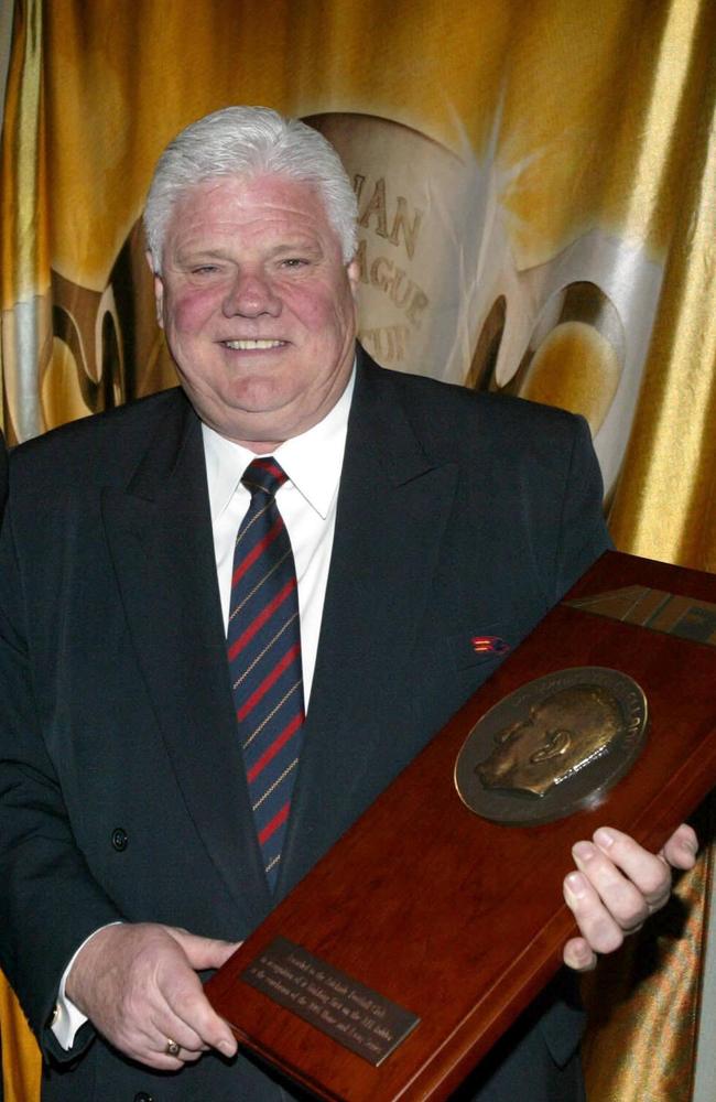 Former Adelaide CEO Bill Sanders with the 2005 McClelland Trophy.