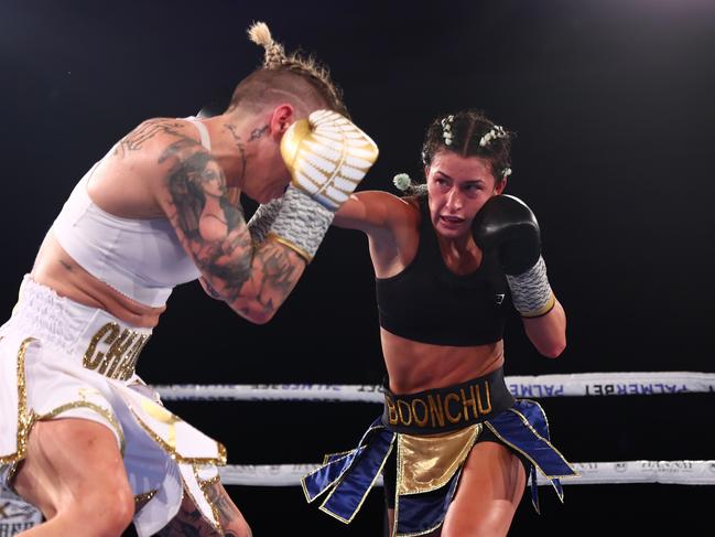 Jasmine Parr lands a punch on Nicila Costello during their WIBA Flyweight World Title fight. Picture: Getty Images