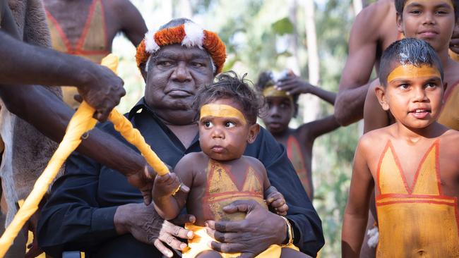 Dr Galarrwuy Yunupingu and members of the Gumatj clan preparing to perform bunggul at the opening ceremony of Garma Festival in Arnhem Land, NT. PHOTOGRAPHER: PETER EVE