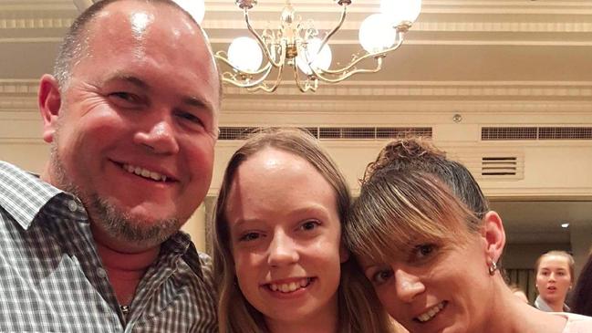 Sorell man Gary Walker died after he lost control of his truck on the Arthur Highway at Eaglehawk Neck on May 4. Pictured with partner Sonia Wood and daughter Zoey.