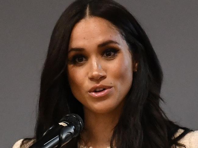 (FILES) In this file photo taken on March 06, 2020 Britain's Meghan, Duchess of Sussex speaks during a school assembly as part of a visit to Robert Clack School in Essex, on March 6, 2020, in support of International Womenâs Day. - Meghan Markle has revealed she suffered a miscarriage in July this year, writing in the New York Times on November 25, 2020 of the deep grief and loss she endured with her husband Prince Harry. (Photo by BEN STANSALL / POOL / AFP) / == STRICTLY EMBARGOED == NO USE AND NO PUBICATION ON ANY PLATFORM UNTIL 22:30 GMT MARCH 7, 2020 ==