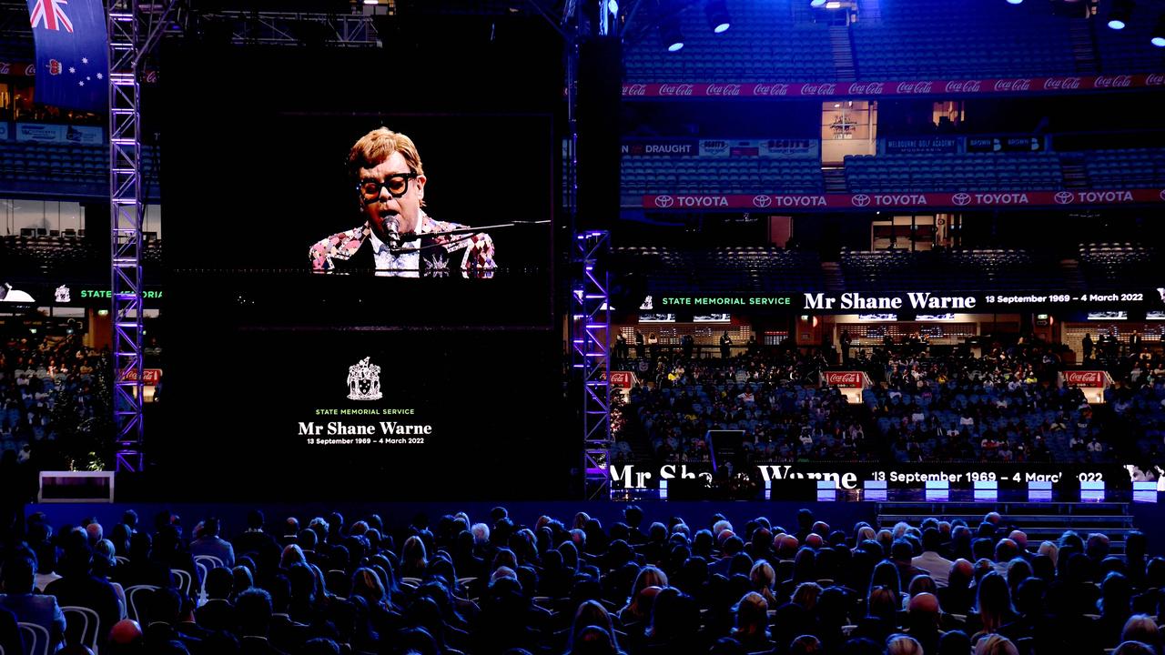 Elton John dedicates a song to Shane Warne on a big screen