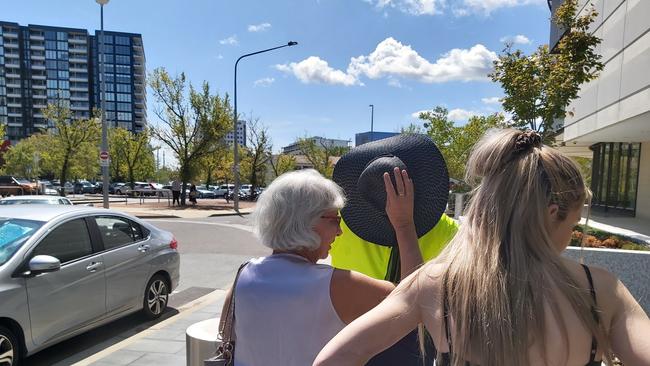 Darcy Edward Page, of Greenway, leaves the ACT Magistrates Court on crutches, accompanied by supporters after being charged with rape and child sex offences. Picture: Craig Dunlop