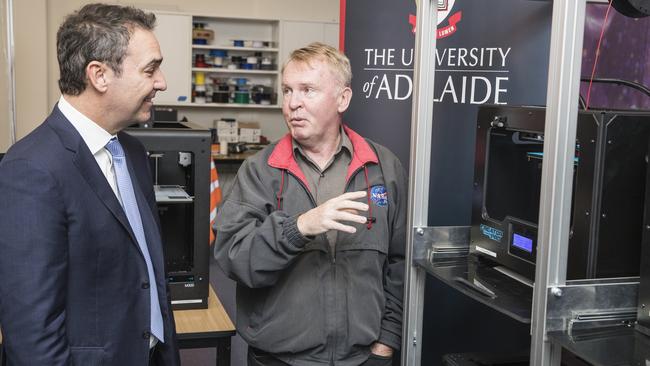 Dr Thomas with Premier Steven Marshall at Adelaide University's 3D printing lab. Picture: Simon Cross