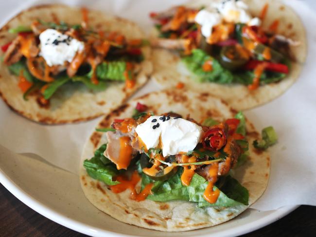 Tacos Chicken Tikka from Sacred Bites featuring shredded Chicken Tikka, crunchy lettuce, coriander, a dollop of yoghurt and a sprinkle of chilli. Picture: NIKKI DAVIS-JONES