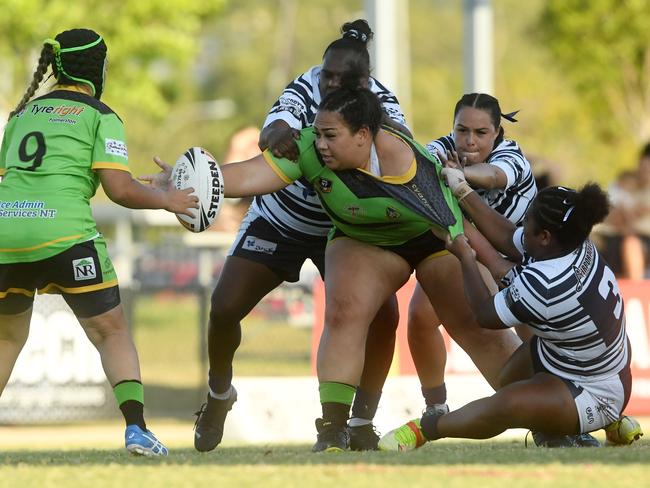 Palmerston Raiders’ Ciara Aigea gets the offload off as she is tackled in the Womens NRLNT Grand Final 2022. Picture: (A)manda Parkinson