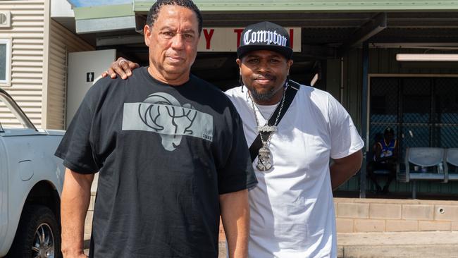 Classic member of pioneering Compton gangsta rap group NWA, DJ Yella, with the son of late band member Eazy-E, Lil Eazy-E, ahead of their performance in Darwin on Friday. Picture: Pema Tamang Pakhrin