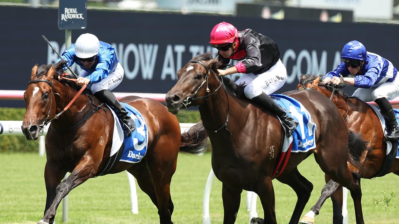 Bellazaine runs past Biewacht to win the Lonhro Plate. Picture: Jeremy Ng/Getty Images