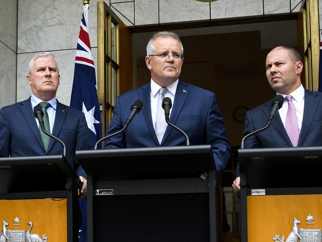 Deputy PM Michael McCormack, PM Scott Morrison and Treasurer Josh Frydenberg in Canberra today. Picture: AAP