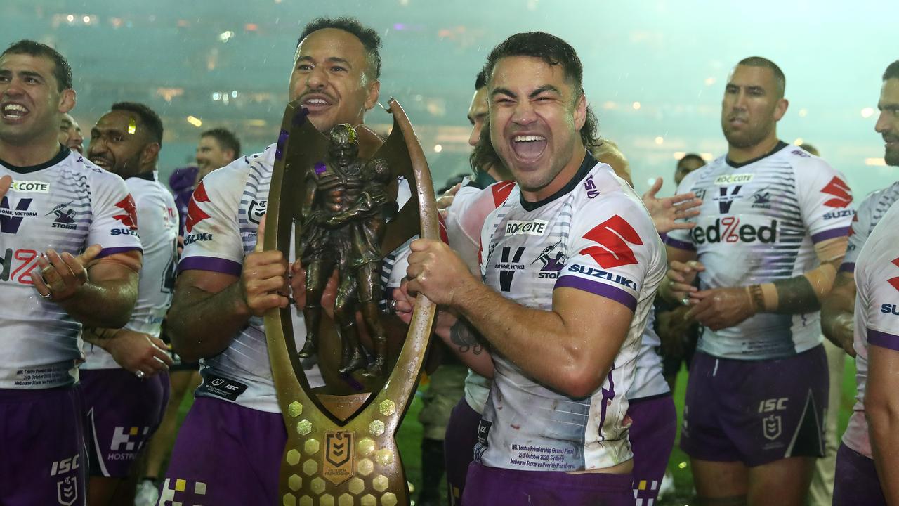 Hughes with the premiership trophy in 2020. Picture: Cameron Spencer/Getty Images