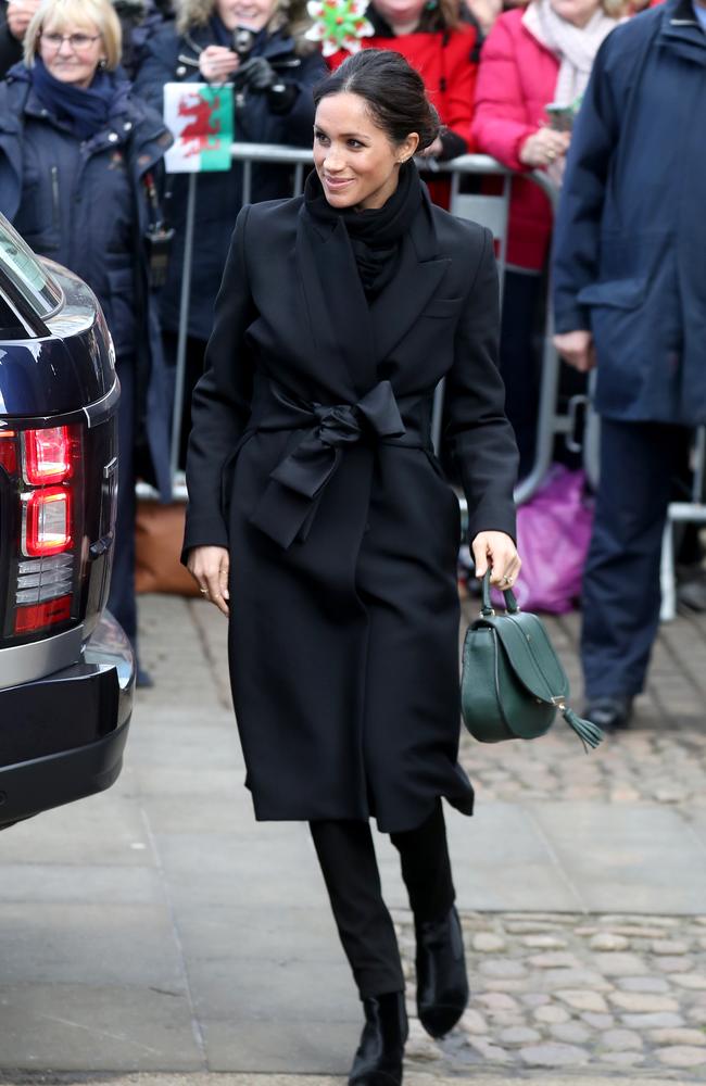 She wore a Stella McCartney coat and her hair in the same ‘messy bun’ as her previous royal visit. Picture: Chris Jackson/Chris Jackson/Getty Images.