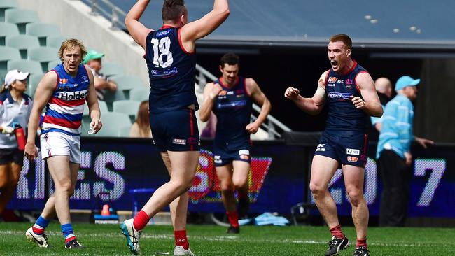 Matt Fuller celebrates kicking a goal with teammate Sam Baulderstone. Picture: Tom Huntley