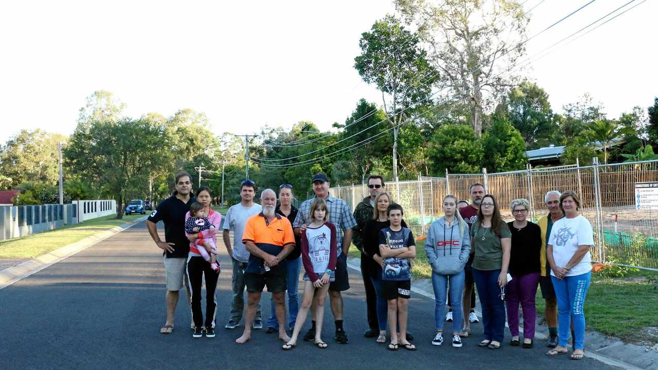 AT WAR: Residents on Laloki St, Camira are desperately fighting to stop a subdivision, and construction of a duplex, going ahead in their street.