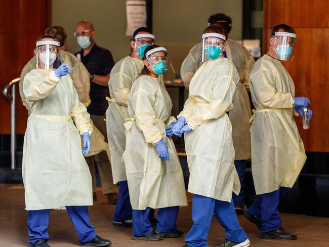 Police and Medical staff around the Peppers Waymouth Hotel in Adelaide on November 24, 2020. Picture Matt Turner.