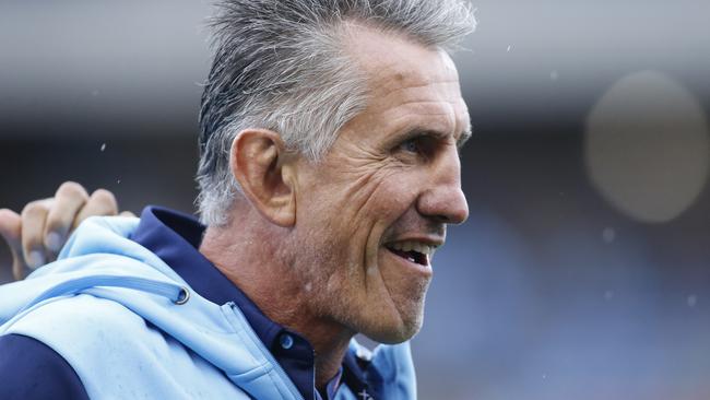 Waratahs coach Rob Penney watches players warm up before the Round 2 Super Rugby match between the New South Wales Waratahs and the Auckland Blues at McDonald Jones Stadium in Newcastle, Saturday, February 8, 2020. (AAP Image/Darren Pateman) NO ARCHIVING, EDITORIAL USE ONLY