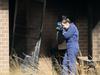 Fight caught on CCTV as home goes up in flames