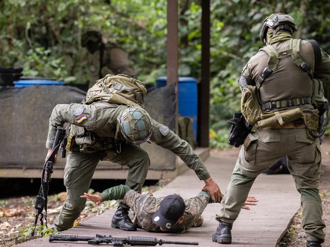 Colombian National Police arrest those working in the clandestine labs quickly after they land. Picture: Jason Edwards