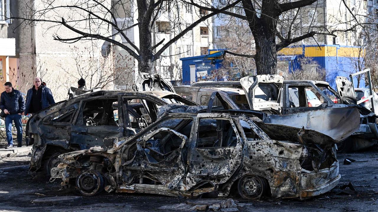 Cars which were destroyed by recent shelling in Kyiv. (Photo by Genya SAVILOV / AFP)