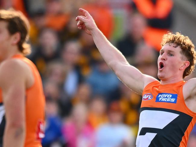 CANBERRA, AUSTRALIA - AUGUST 04: Tom Green of the Giants celebrates a goal during the round 21 AFL match between Greater Western Sydney Giants and Hawthorn Hawks at Manuka Oval, on August 04, 2024, in Canberra, Australia. (Photo by Morgan Hancock/Getty Images)