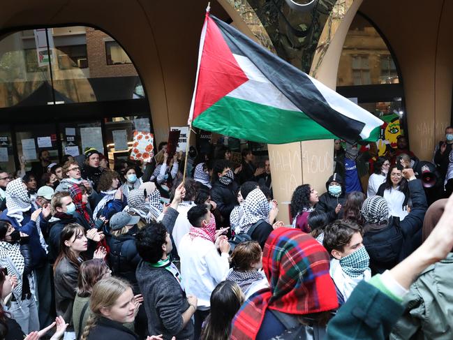 MELBOURNE, AUSTRALIA - NewsWire Photos, MAY 17, 2024. Pro Palestine protesters continue to occupy the Arts Building at Melbourne University. Students gather to listen to a press conference outside the building.  Picture: NewsWire / David Crosling