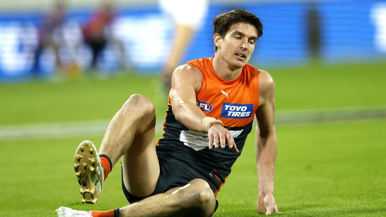 Sam Taylor after injuring his hamstring against the Lions at Manuka Oval. Picture: Phil Hillyard