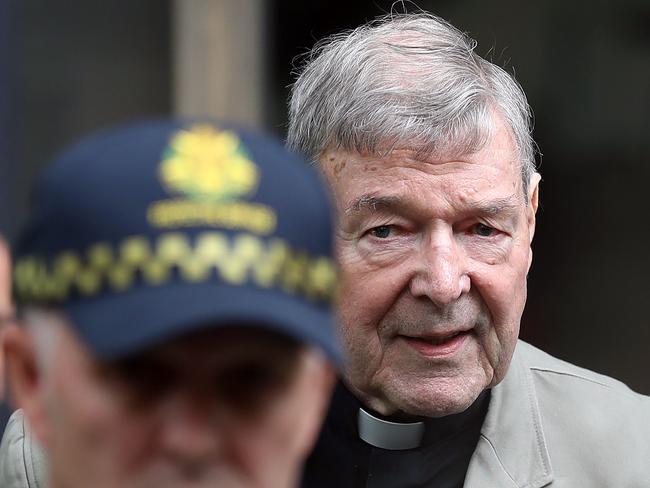 (FILES) In this file photo taken on February 26, 2019, Cardinal George Pell leaves the County Court of Victoria after prosecutors decided not to proceed with a second trial on alleged historical child sexual offences in Melbourne. - Cardinal George Pell is to be sentenced on March 13, 2019, following conviction for child sex crimes. (Photo by CON CHRONIS / AFP)