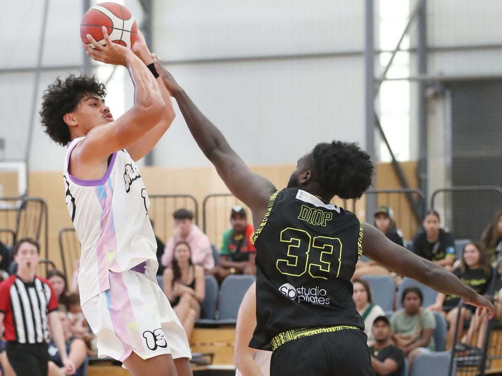 Basketball Queensland First Nations Championships at Coomera. Dreamers (white) v Erub Utd. Picture Glenn Hampson