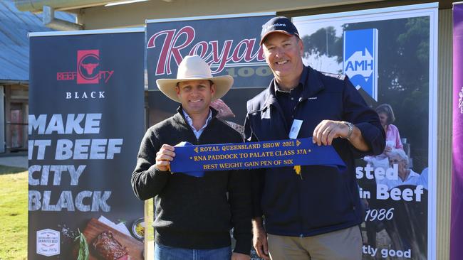 Palgrove Pastoral Company's Ben Noller accepting the first place ribbon from Rabobank’s Mal Porter at the recent Paddock to Palate competiton.