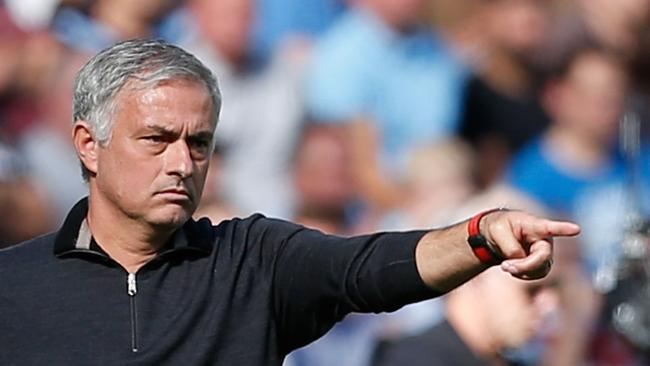 Manchester United's Portuguese manager Jose Mourinho gestures from the touchline during the English Premier League football match between West Ham United and Manchester United at The London Stadium, in east London on September 29, 2018. (Photo by Ian KINGTON / AFP) / RESTRICTED TO EDITORIAL USE. No use with unauthorized audio, video, data, fixture lists, club/league logos or 'live' services. Online in-match use limited to 120 images. An additional 40 images may be used in extra time. No video emulation. Social media in-match use limited to 120 images. An additional 40 images may be used in extra time. No use in betting publications, games or single club/league/player publications. /