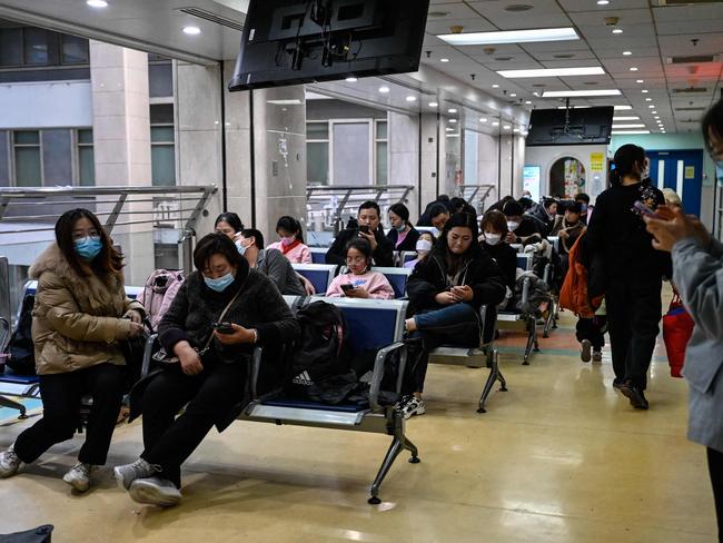 WHO urged people to take steps to reduce the risk of infection. China has reported an increase in "influenza-like illness" since mid-October. Picture: AFP