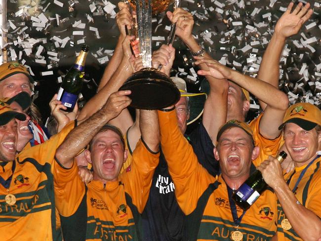 Aust cricket captain Ricky Ponting (C) and his teammates celebrate with the trophy of the ICC Cricket World Cup at the Kensington Oval in Bridgetown, 28 Apr 2007. Australia defeated Sri Lanaka to win for the third time. AFP PicJewel/Samad sport o/seas celebrations tickertape ticker tape