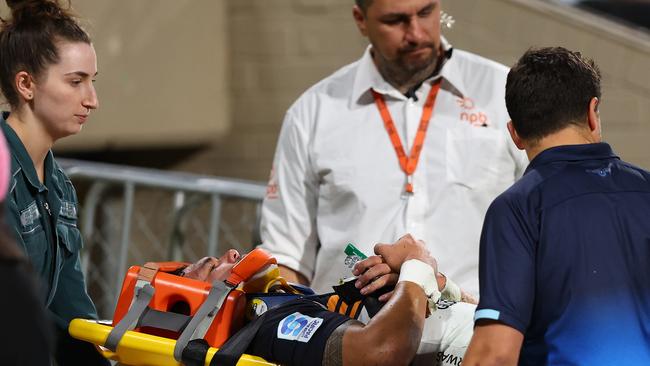 Noah Lolesio was stretchered from the field with his neck in a brace – before being cleared of serious injury. Picture: Getty