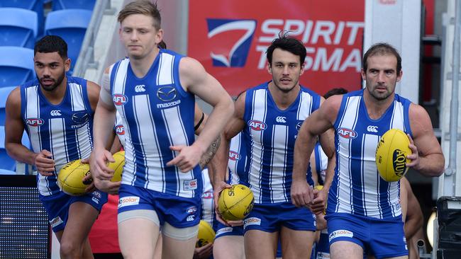 Jack Ziebell of the Kangaroos leads out the team during the round 13 AFL match between the North Melbourne Kangaroos and the Greater Western Sydney Giants at Blundstone Arena on June 13, 2021 in Hobart, Australia. (Photo by Steve Bell/Getty Images)