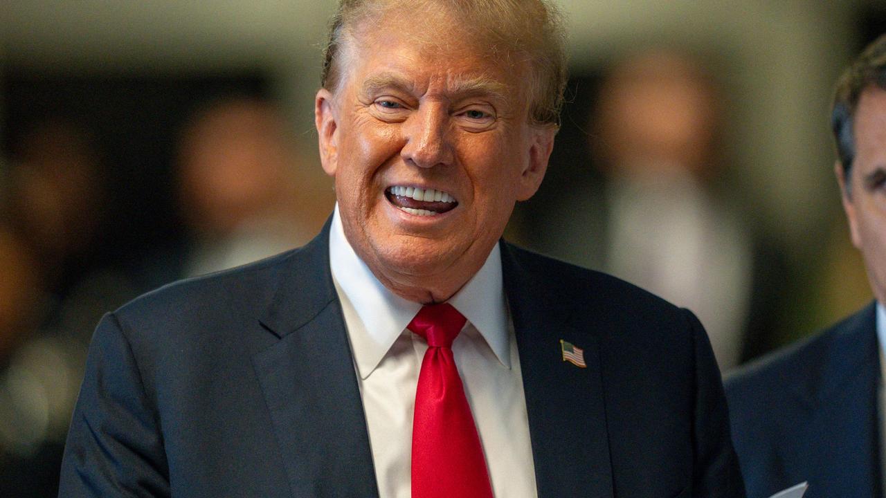 Former US President and Republican presidential candidate Donald Trump speaks to the media during his criminal trial. (Photo by Steven Hirsch / POOL / AFP)