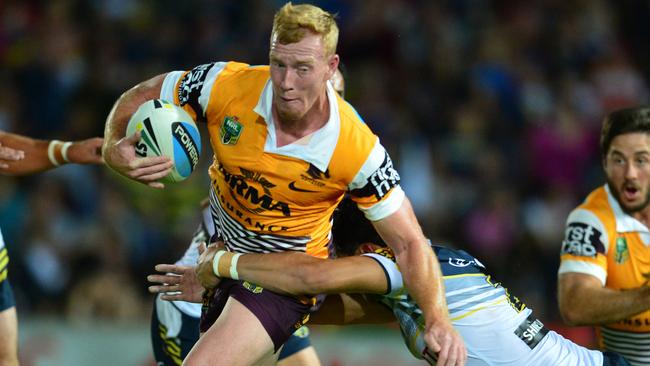 Jack Reed is tackled by the Cowboys defence. Picture: Evan Morgan