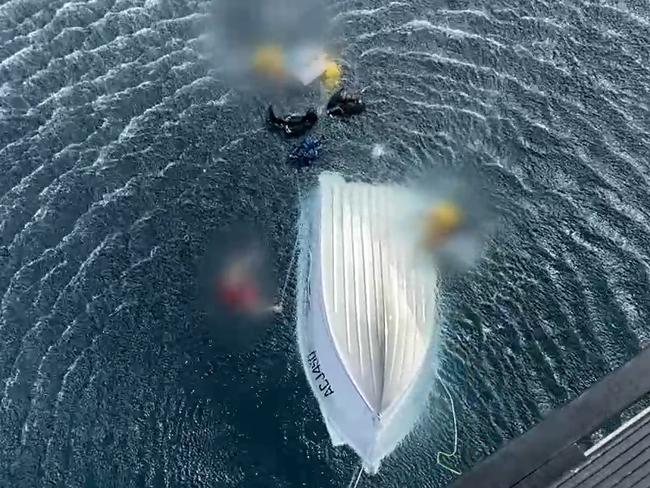 The Sunshine Coast-based RACQ LifeFlight Rescue helicopter crew joined a multi-agency search this afternoon north of Moreton Island, to help locate an overturned vessel. , The aeromedical chopper was tasked to assist at around 3pm. , The rescue crew lowered ropes down to help the three boaties back onto the vessel, before guiding Queensland Water Police to their location.  They were taken to shore by Queensland Water Police for further treatment. Picture RACQ LifeFlight