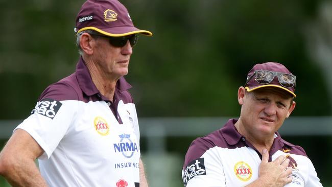 Wayne Bennett with Kevin Walters ... expert at the old “cut the assistant in half trick”. Picture:  Darren England.