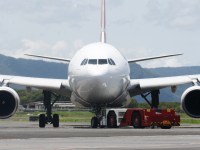 A Qantas Boeing 737 passenger jet aircraft taxis on the tarmac apron at Cairns Airport, ready to take tourists and local passengers to southern Australian destinations. Picture: Brendan Radke