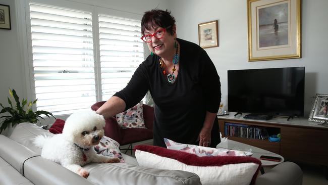 Dianne Shiels with her dog Ariane, photographed at her current home at Jasmine Grove. She says that at age 67 she found herself “basically homeless”. Picture: Britta Campion